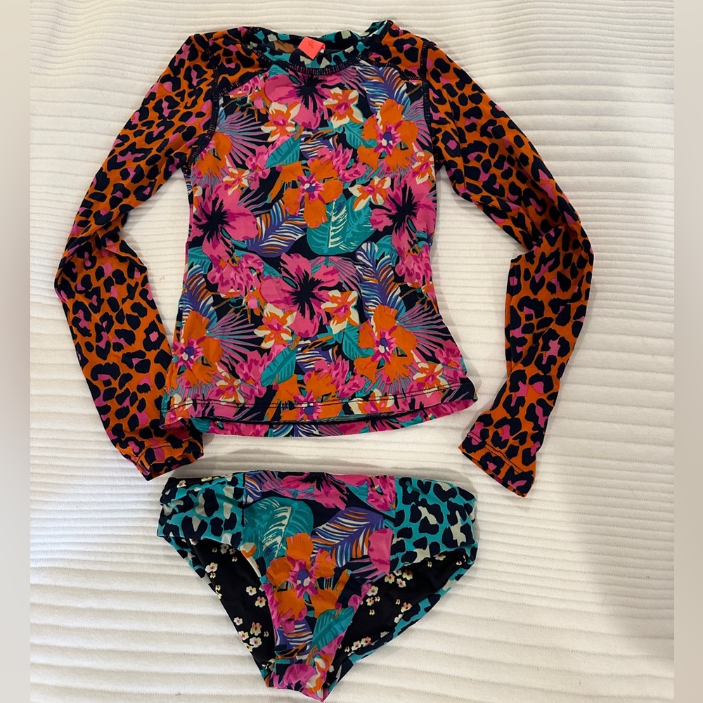 Maaji girls rashguard top and bikini bottom swimsuit.